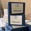 Radiance Bar packaging with 'Eleventh' branding on a blurred background