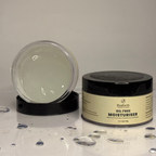 Oil-free moisturizer jar with open lid on a gray background